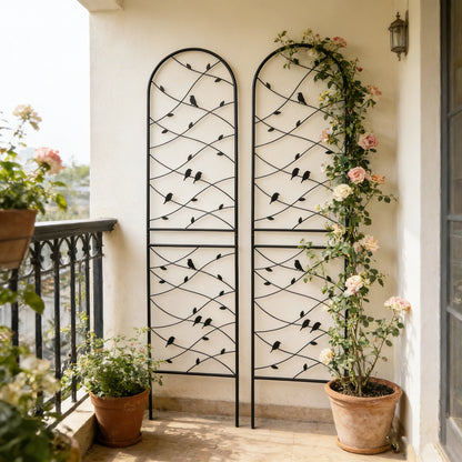 Set of 2 black metal garden trellises with decorative bird and vines top accents