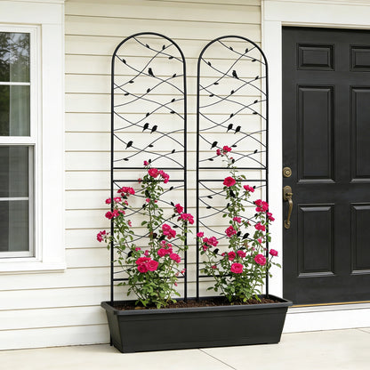 Pair of decorative bird design metal trellises set together on one side of a front porch entrance
